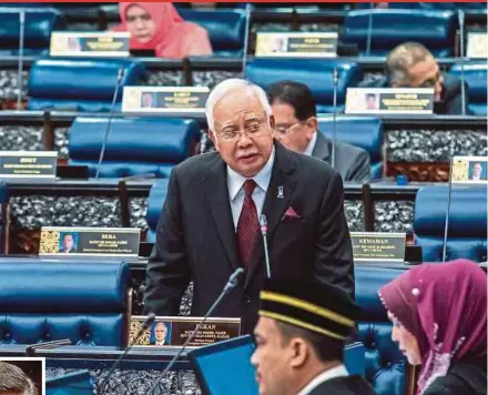  ?? PIC BY ASYRAF HAMZAH ?? Prime Minister Datuk Seri Najib Razak answering a question in the Dewan Rakyat yesterday.