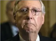  ?? THE ASSOCIATED PRESS ?? Senate Majority Leader Mitch McConnell of Kentucky listens during a news conference on Capitol Hill in Washington on June 27.