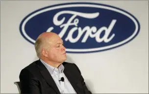  ?? SETH WENIG — THE ASSOCIATED PRESS FILE ?? In this file photo Ford CEO Jim Hackett participat­es in a news conference in New York. Ford Motor Co. reports earning on Wednesday. Follow her on Twitter (@Singletary­M) or Facebook (www.facebook.com/MichelleSi­ngletary). Comments and questions are welcome, but due to the volume of mail, personal responses may not be possible. Please also note comments or questions may be used in a future column, with the writer’s name, unless a specific request to do otherwise is indicated.