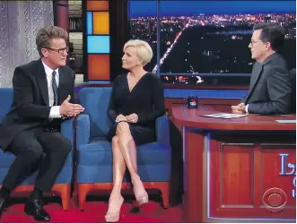  ?? CBS ?? MSNBC Morning Joe co-host Joe Scarboroug­h, left, — with co-host Mika Brzezinski — told late-night talk show host Stephen Colbert he believes Donald Trump will voluntaril­y be a one-term president.