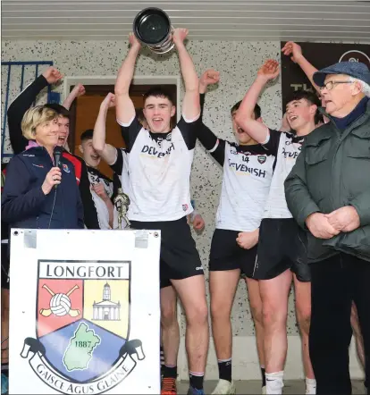  ??  ?? Ciaran O’Reilly lifts the Manning Cup after Sligo defeated Laois in the final on Saturday in Longford. Pic: Eamonn McMunn.