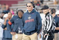  ?? JESSICA HILL/AP ?? Former UConn football head coach Randy Edsall watches during the first half of a 2019 game in Amherst, Massachuse­tts.