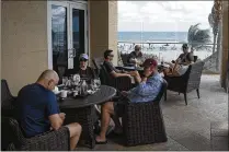  ?? ANDRES LEIVA / THE PALM BEACH POST ?? Thanksgivi­ng reservatio­ns at the Palm Beach Marriott Singer Island Beach Resort & Spa’s 3800 Ocean Restaurant have grown in recent years.