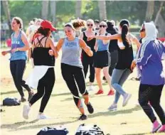  ?? A.K Kallouche/Gulf News ?? Participan­ts enjoy working out at the Weekend Fitness Carnival at Safa Park yesterday. Over 40 sports and activities took place at the park.