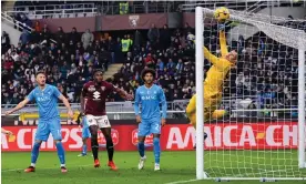  ?? Fabio Ferrari/AP ?? Napoli goalkeeper Pierluigi Gollini fails to block a shot by Alessandro Buongiorno. Photograph: