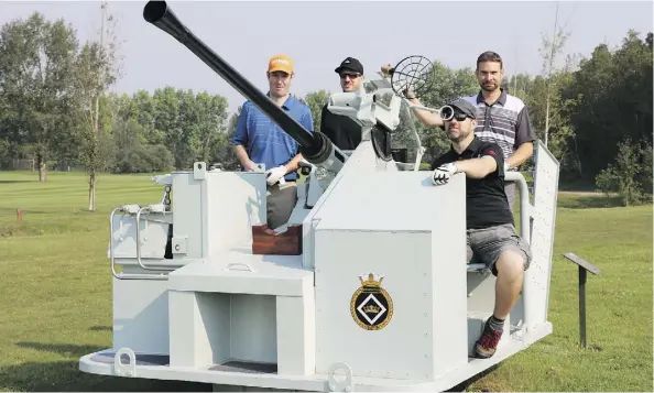  ?? PHOTOS: SUPPLIED ?? Swarms of wasps were on the Garrison Memorial Golf Course last week during the VETS annual golf tournament and this foursome jokingly decided to knock some of those dive bombers out of the air with this retired naval anti-aircraft gun. They are Adam Mallon, Adam Biel, Brian Heerensper­ger and Daniel Johannesso­n. The tournament, played in hot weather, supported Little Warriors, Valour Place and Habitat for Humanity.