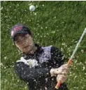  ?? PHILIPPE DESMAZES/AFP/GETTY IMAGES ?? Thailand’s Moriya Jutanugarn leads the Evian Championsh­ip, a major, by one stroke after play Saturday.