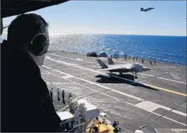  ?? Don Bartletti Los Angeles Times ?? AN F-35C lands on the USS Nimitz aircraft carrier off San Diego in 2014. The jet has three variants to serve the unique needs of the Air Force, Marines and Navy.