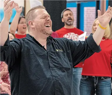  ?? JENNY ODENDAHL PHOTO COURTESY OF JORDAN TRAVIS ?? Jordan Travis, pictured leading his InstaChoir in 2019, is pumped to lift spirits with his virtual choir’s performanc­e of ‘O Canada’ online on July 1.