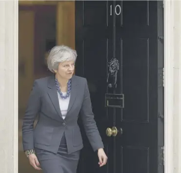  ?? PICTURE; GETTY IMAGES ?? 0 Theresa May outside Downing Street yesterday