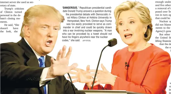  ?? (AP FOTOS) ?? ‘DANGEROUS.’ Republican presidenti­al candidate Donald Trump answers a question during the presidenti­al debate with Democratic rival Hillary Clinton at Hofstra University in Hempstead, New York. Clinton says Trump was too easily provoked to serve as...