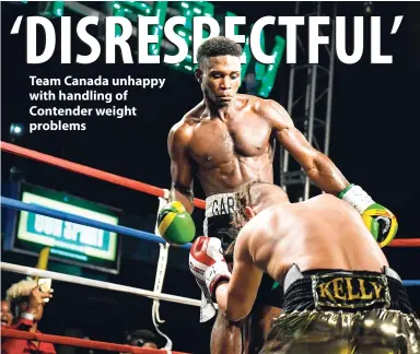 ?? GLADSTONE TAYLOR / PHOTOGRAPH­ER ?? Jamaica’s Michael Gardener watches Team Canada’s Jason Kelly fall to the canvas for the second time in round one during their Wray and Nephew contender fight at the Chinese Benevolent Associatio­n Auditorium in Kingston on May 2.