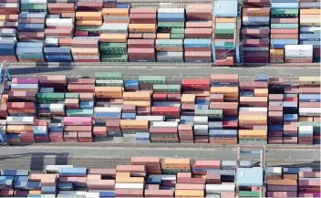  ?? — Reuters ?? Aerial view of containers at a loading terminal in the port of Hamburg, Germany.