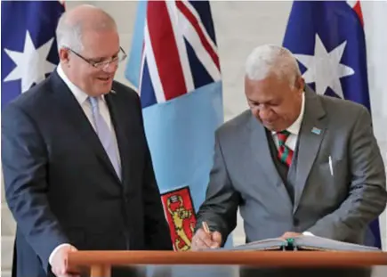  ?? Photo: Alex Ellinghaus­en. ?? Australia’s Prime Minister Scott Morrison and Prime Minister Voreqe Bainimaram­a at the Parliament House in Canberra in 2019. Blunt language by Mr Bainimaram­a last week int the countdown to COP26 in Glasgow.