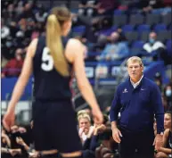  ?? Jessica Hill / Associated Press ?? UConn coach Geno Auriemma with Paige Bueckers in the first half during a game in Hartford on Nov. 14.