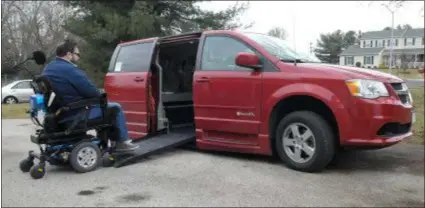  ??  ?? Powering up a ramp into a modified Dodge van that allows him to gain access to the vehicle unassisted February 6, 2019.