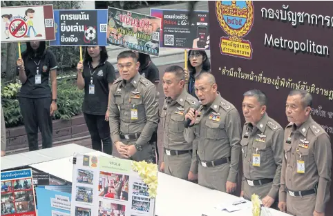  ?? APICHART JINAKUL ?? Deputy national police chief Chalermkia­t Srivorakha­n, centre, leads a press briefing yesterday on plans to step up measures to tackle illegal football gambling during the World Cup.