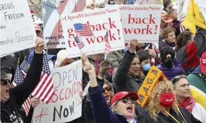  ??  ?? People rally against the stay-at-home order in Madison last month. Photograph: Amber Arnold/AP