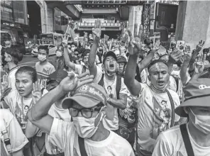  ?? LAUREN DECICCA/GETTY IMAGES ?? The Myanmar Migrant Workers Union marched in conjunctio­n with Thai labor groups through central Bangkok, Thailand, on Labor Day Monday to support workers’ rights and to bring attention to the conflict in Myanmar.