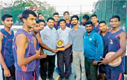  ??  ?? Members of the Boys Sports Company team receive the trophy after winning the Indian Schools Basketball Championsh­ip in Hyderabad.