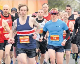  ??  ?? Off they go . . . the long-distance runners set off from the start line at festsival Fields.