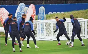  ?? (AFP) ?? Paris Saint-Germain’s players take part in a training session at the ‘Camp des Loges’ near Paris recently.