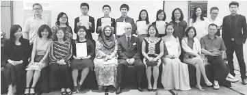  ??  ?? The recipients with Dr Ben Schmidt (seated fifth right) who is regional director of South East Asia and Pacific Cambridge Assessment Internatio­nal Education and the others.