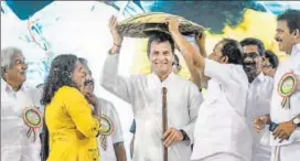  ?? PTI ?? Congress president Rahul Gandhi being felicitate­d during an event to address 'fishermen's parliament', at Triprayar in Thrissur, Kerala, on Thursday.