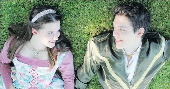  ?? — EMILY JANE KING ?? Maggie Stewart, left, and Finnegan Howes only have eyes for each other in Romeo and Juliet, being staged by the Carousel Theatre for Young People’s Teen Shakespear­e Program from July 28 to Aug. 12 on Granville Island.