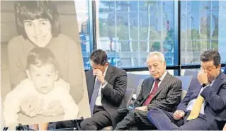  ?? AMY BETH BENNETT/SOUTH FLORIDA SUN SENTINEL ?? The family of Evelyn Udell weep at a press conference shortly after her death calling for new legislatio­n.