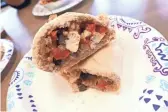  ?? DOMINIC ARMATO/THE REPUBLIC ?? Chick-less fajita pasty with rice, beans and onions at Sonsons Pasty Co.