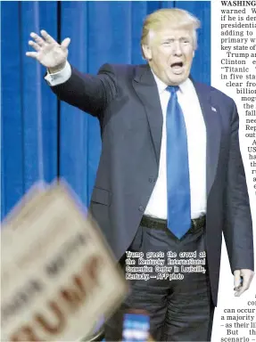  ??  ?? Trump greets the crowd at the Kentucky Internatio­nal Convention Center in Louisville, Kentucky. — AFP photo