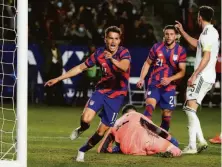  ?? Marcio Jose Sanchez / Associated Press ?? Midfielder Cole Bassett (left) celebrates after scoring the lone goal in the United States’ win over Bosnia and Herzegovin­a.