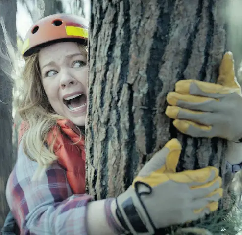  ?? KIA MOTORS AMERICA VIA AP ?? An image from Kia Motors America’s Super Bowl spot in which Melissa McCarthy humorously takes on political causes like saving whales, ice caps and trees, to promote the fuel efficiency of its 2017 Niro crossover.