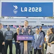  ?? Allen J. Schaben Los Angeles Times ?? MAYOR ERIC GARCETTI speaks in front of a group including L.A. bid chairman Casey Wasserman, left, and former Olympian Janet Evans, right. A1