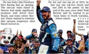  ?? AP PHOTO BY CHUCK BURTON ?? Martin Truex Jr celebrates in Victory Lane after winning a NASCAR Cup Series auto race at Charlotte Motor Speedway in Concord, N.C., Sunday.
