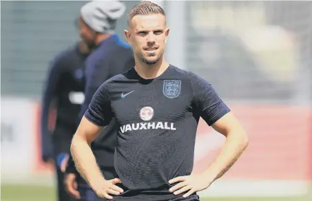  ??  ?? Liverpool’s former Sunderland midfielder, Jordan Henderson, takes a break in England trainining ahead of tonight’s clash with Costa Rica.