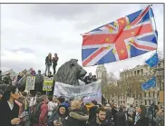  ?? AP/TIM IRELAND ?? Demonstrat­ors fill Trafalgar Square during Saturday’s rally in London.