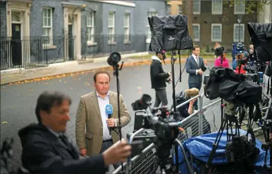  ?? Photo: AFP ?? Journalist­s report from outside 10 Downing Street in central London on October 21, 2022. Contenders bidding to succeed Prime Minister Liz Truss canvassed for support with her predecesso­r Boris Johnson, who is reportedly considerin­g a sensationa­l comeback, while opposition parties demanded an early general election to end months of political chaos.