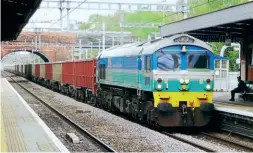  ?? JIM TUCKER/RCTS ?? After 35 years and still working hard, No. 59001 Yeoman Endeavour heads west through Twyford on May 7, 2021 at the head of a long rake of stone empties.