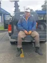  ?? JOHN LOPE ?? John Lopez sits on his truck after spending Tuesday in a boat rescuing people and animals stranded by flooding in the Houston area.