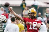  ?? MORRY GASH — THE ASSOCIATED PRESS ?? Green Bay Packers’ Aaron Rodgers runs a drill at the NFL football team’s practice field Wednesday, July 27, 2022, in Green Bay, Wis.