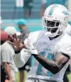  ?? LYNNE SLADKY/AP ?? Miami Dolphins wide receiver DeVante Parker catches a pass at the team’s training facility June 5 in Davie.