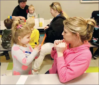  ?? Special to The Saline Courier ?? Parents and students bond together during a recent Dawson Parents as Teachers connection meeting.