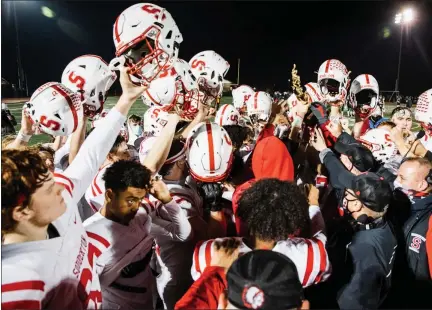  ?? JAMES BEAVER/FOR MEDIANEWS GROUP ?? The Souderton Indians celebrate after winning the District 1-6A championsh­ip over Pennridge.