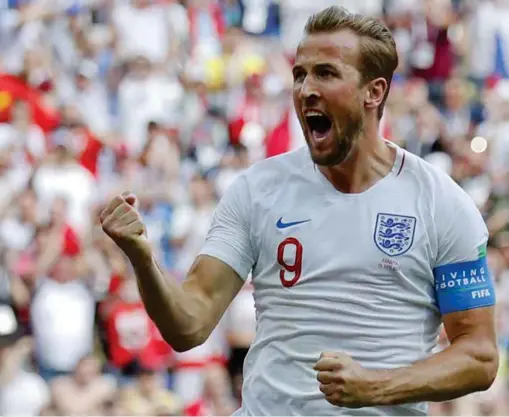  ?? FOTO: ANTONIO CALANNI, AP ?? VMS TOPPSCORER: Harry Kane jublet etter sitt første straffemål mot Panama.