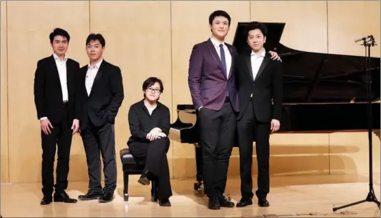  ?? PROVIDED TO CHINA DAILY ?? The Leeds Internatio­nal Piano Competitio­n takes place in 17 cities across the world, including Beijing for the first time. Chinese participan­ts include (from left) Wang Zixiang, Ye Fangzhou, Li Yuzhang, Fang Yan and Liu Ziyu.