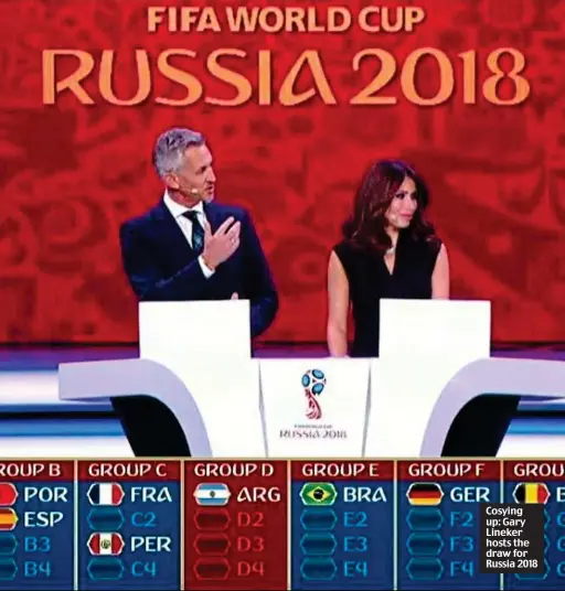  ??  ?? Cosying up: Gary Lineker hosts the draw for Russia 2018