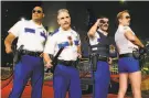  ?? John Shearer / WireImage ?? Carlos Alazraqui (second from left) and his castmates from “Reno 911.”