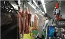  ?? Photograph: Bloomberg via Getty Images ?? File photo of a Rivalea pork processing and packaging area in Corowa. The ACCC is investigat­ing if allowing JBS to add more pork to its operation would stifle competitio­n.